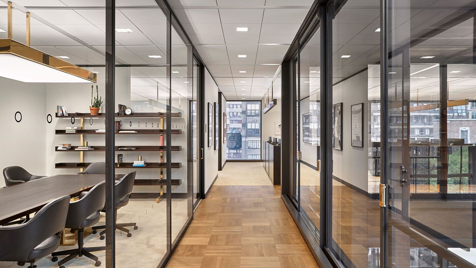 Ultralight doors and partitions in dark anodized aluminum integrating light, privacy, and style