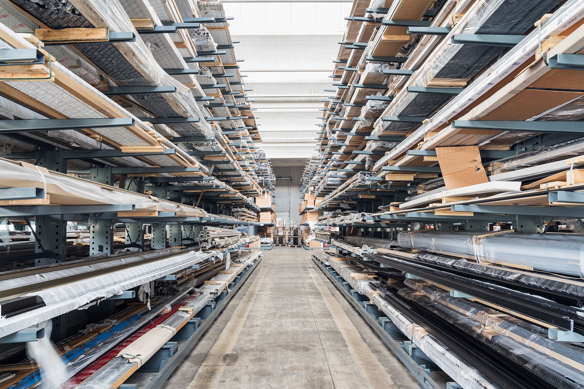 Interior of the IOC project partners warehouse, where office solutions and modular partition walls are organized and prepared for delivery.